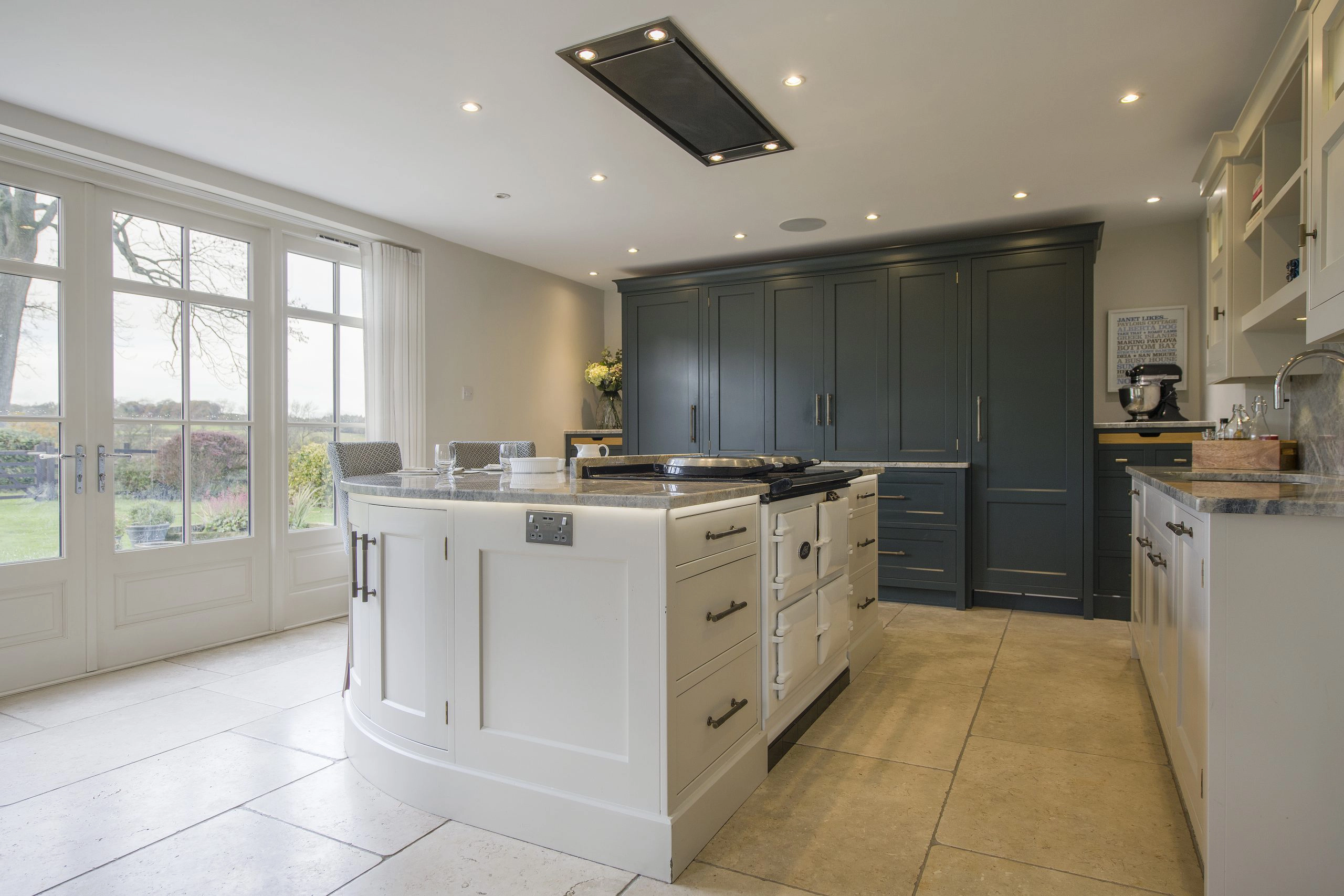 Country family kitchen with white Aga
